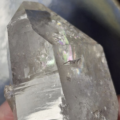 Lemurian quartz point tip detail with internal rainbow, Colombia
