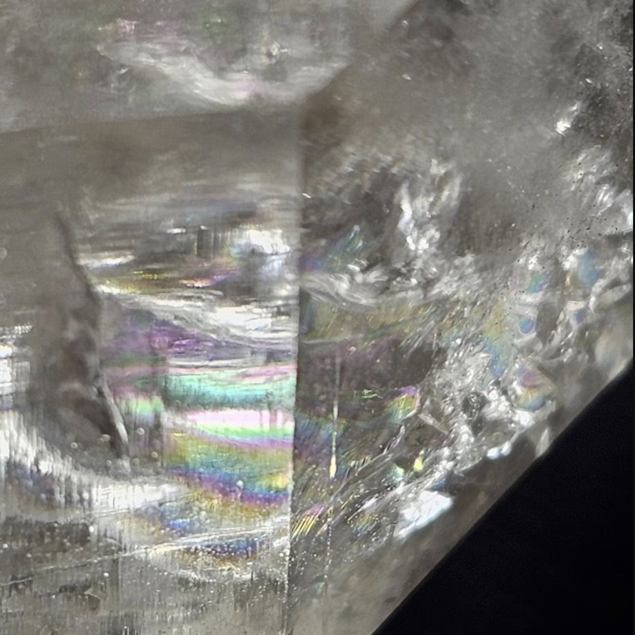 Lemurian quartz point rainbow inclusion close-up, Colombian quartz crystal