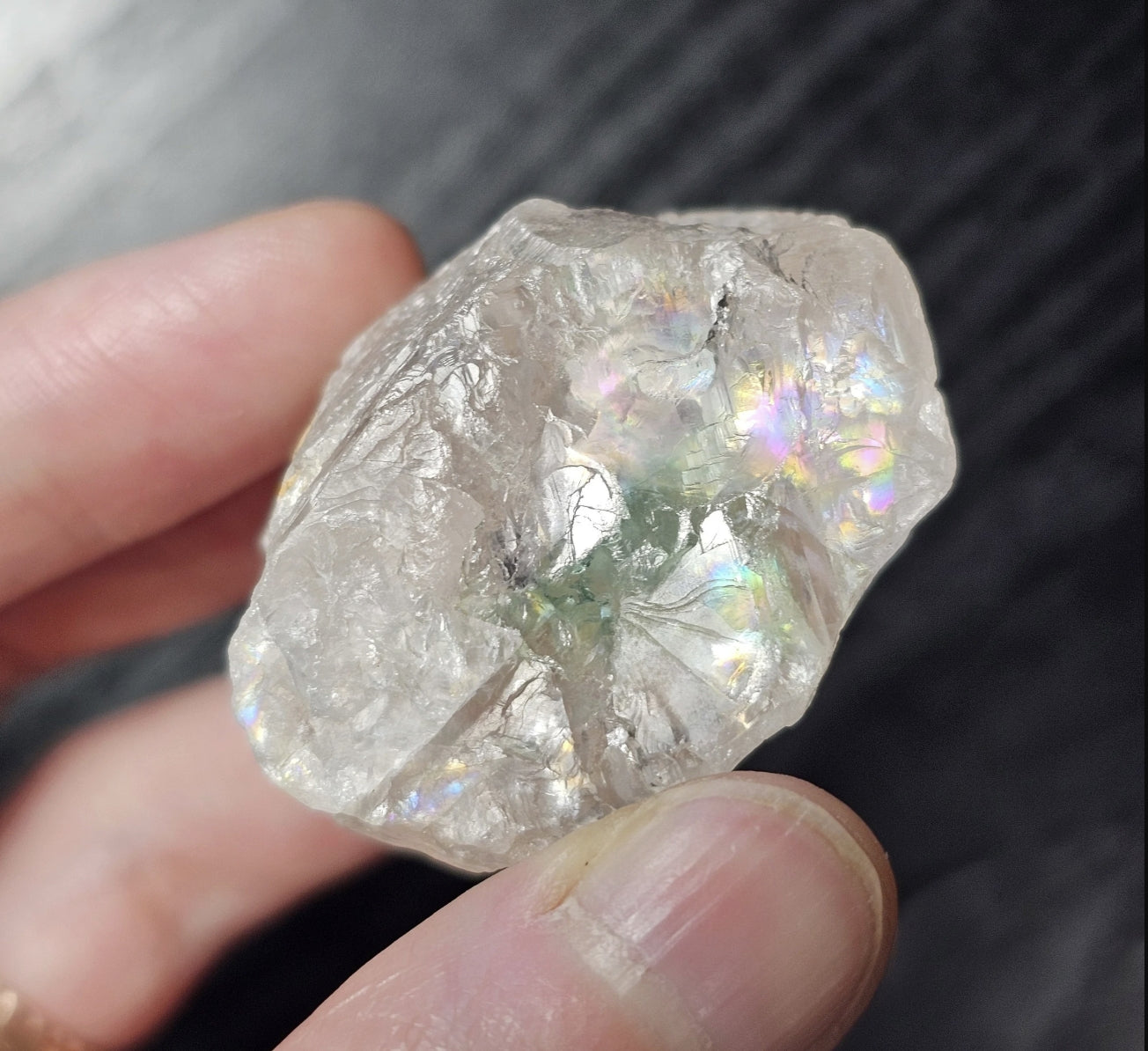 Colombian chrome phantom fluorite crystal showing natural rainbow inclusions close up