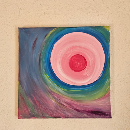 A square 8x8 inch spiritual painting displayed on a neutral wall to show the size and scale of the energy art in a home meditation space.
