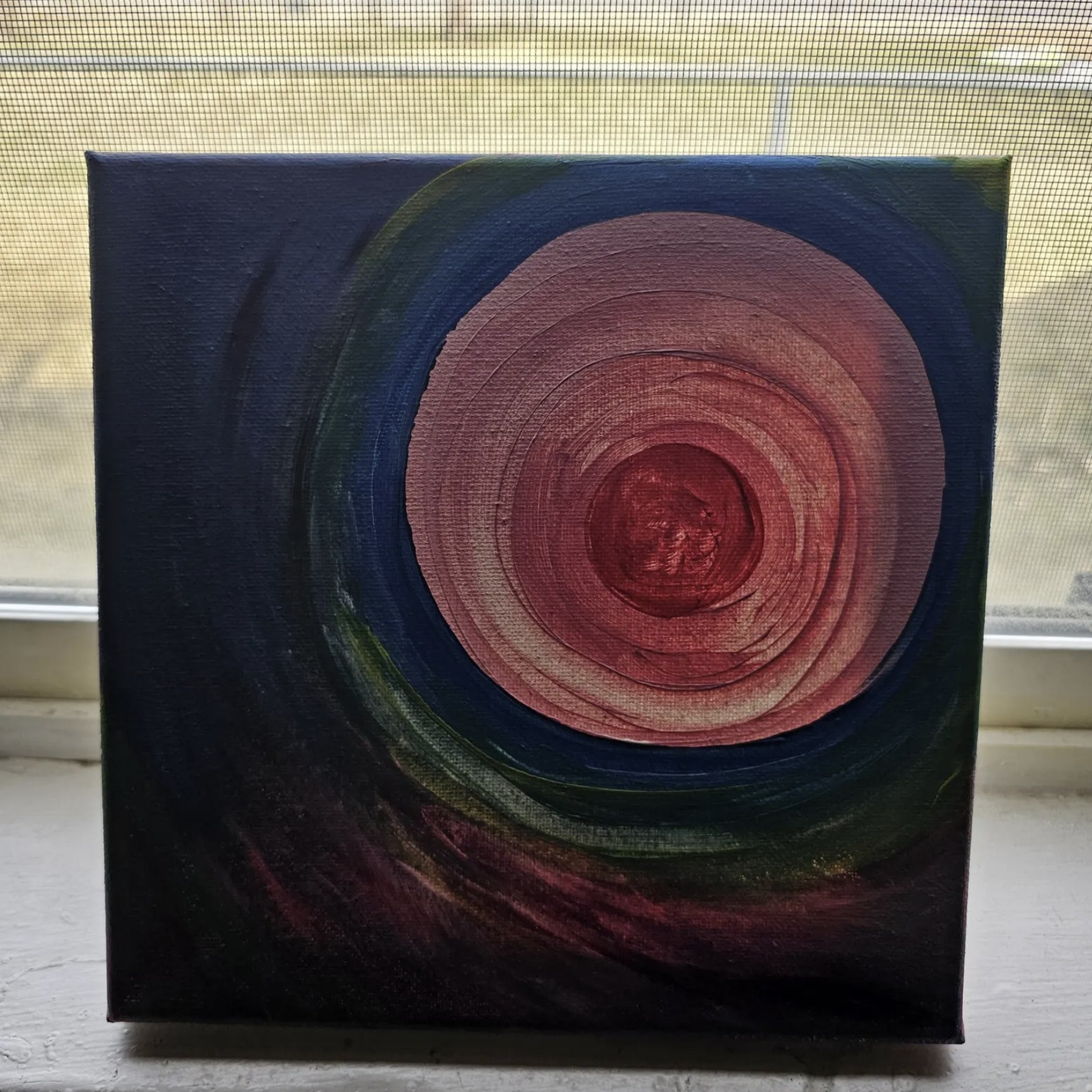 The Divine Feminine Portal painting shown with light shining through the canvas, revealing the unique depth of the pink and green acrylic layers and a glowing energy effect.