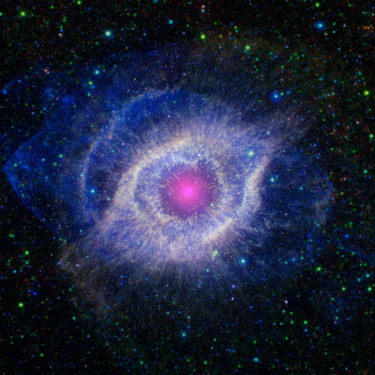 Helix Nebula (NGC 7293), a circular planetary nebula with vivid blue and magenta. Image: NASA/JPL-Caltech.