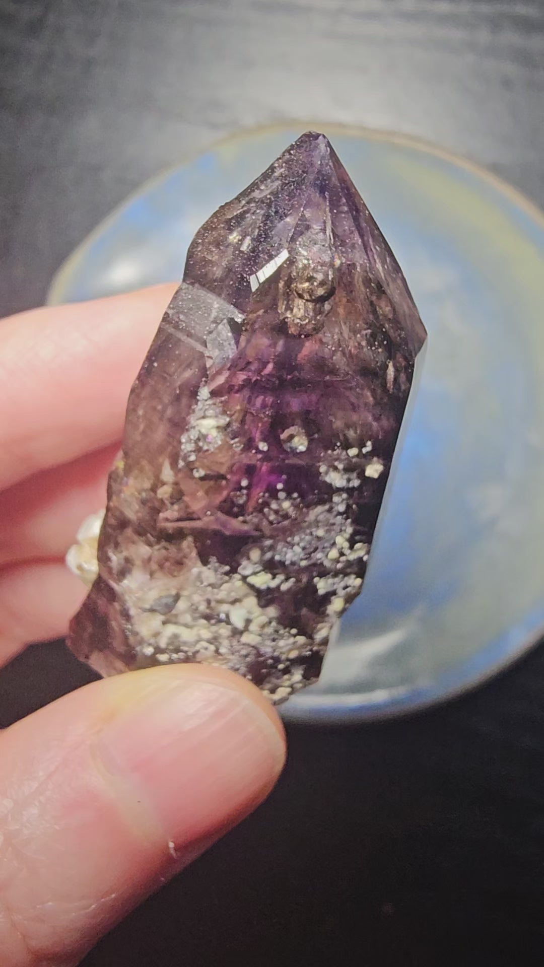 Brandberg Amethyst Enhydro from Namibia — two moving water bubbles visible inside 34g violet flame crystal